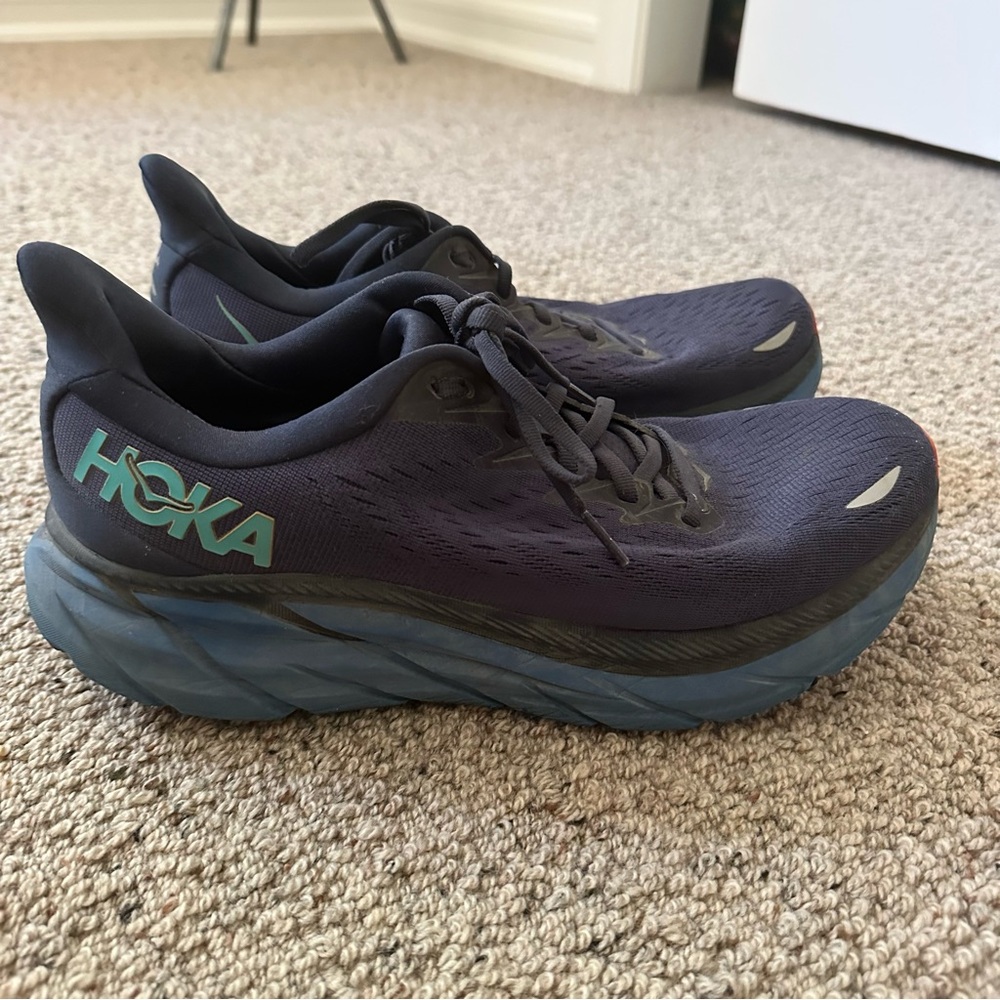 Hoka Dark Blue Athletic Shoes with Teal Logo